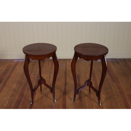 194 - A PAIR OF CONTINENTAL KINGWOOD MARQUETRY AND GILT BRASS MOUNTED OCCASIONAL TABLES each of circular o... 