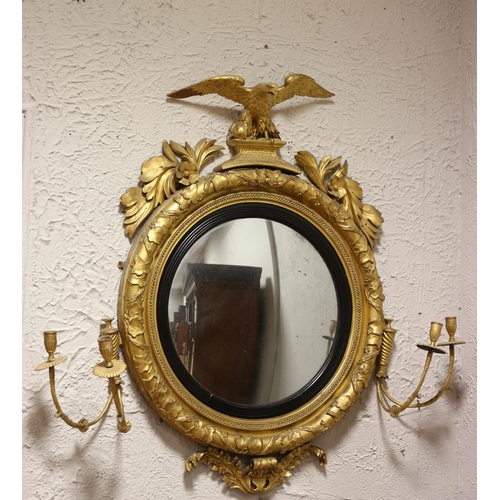 2 - A 19TH CENTURY GILTWOOD AND GESSO GIRANDOLE CONVEX MIRROR the foliate moulded frame flanked on each ... 