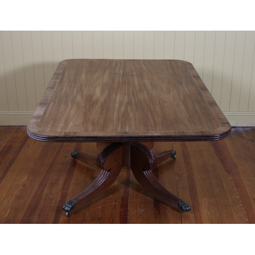 21 - A 19TH CENTURY MAHOGANY AND ROSEWOOD CROSSBANDED POD TABLE of rectangular outline with rounded corne... 