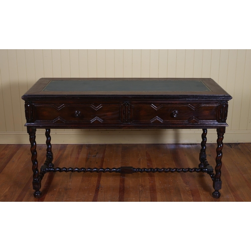 22 - A JACOBEAN STYLE OAK WRITING TABLE the rectangular top with leather inset above two frieze drawers o... 