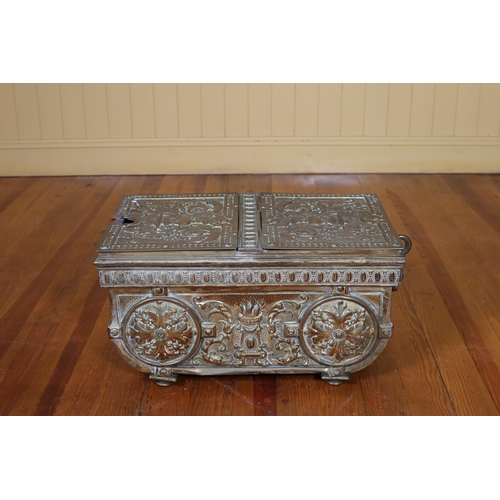 248 - A VINTAGE OAK AND BRASS DOUBLE LIDDED FUEL BIN of rectangular form with carrying handles moulded in ... 