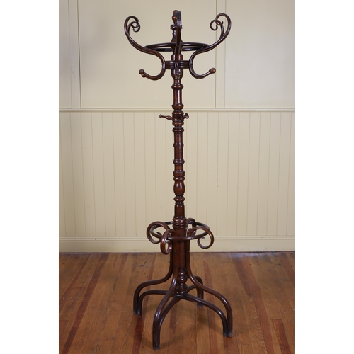 26 - A BENTWOOD HAT COAT AND STICK STAND of typical form with revolving top 95cm (h) x 68cm (w)