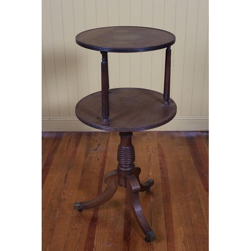 29 - A GEORGIAN MAHOGANY TWO TIER GRADUATED DUMBWAITER the circular dish top raised on fluted supports ab... 