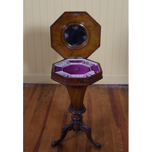 30 - A VICTORIAN BURR WALNUT AND MAHOGANY WORKBOX of octagonal outline the hinged lid containing compartm... 