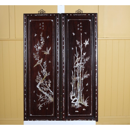 301 - A PAIR OF HARDWOOD INLAID PANELS each decorated with birds amongst foliage 92cm (h) x 30cm (w)