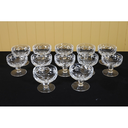 321 - A SET OF TWELVE CUT GLASS SUNDAE DISHES