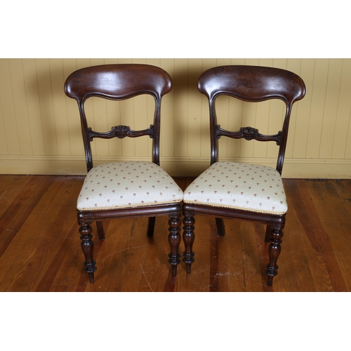 357 - A PAIR OF VICTORIAN MAHOGANY DINING CHAIRS each with a curved top rail and carved splat with upholst... 