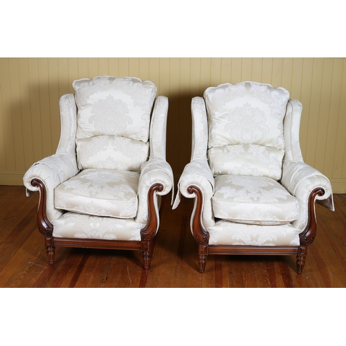 359 - A PAIR OF CHERRYWOOD AND UPHOLSTERED WING CHAIRS with loose cushions and scroll over arms on fluted ... 