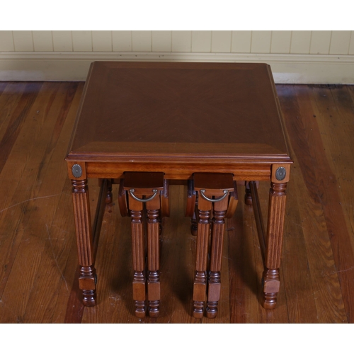 361 - A KINGWOOD CROSSBANDED TABLE of rectangular outline on fluted supports and turned legs containing a ... 