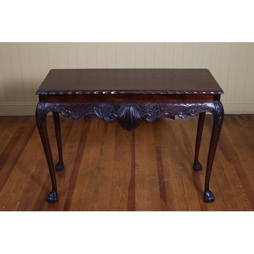 368 - A CHIPPENDALE STYLE CARVED MAHOGANY SIDE TABLE of rectangular outline with gadroon rim and shell car... 