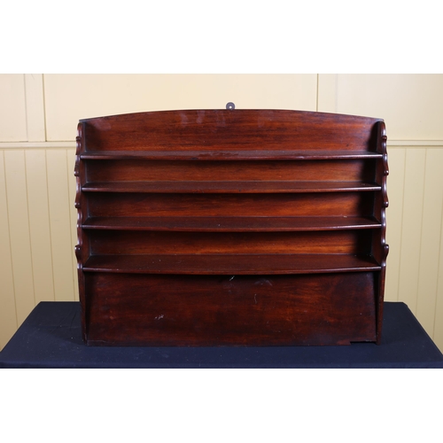 384 - A 19TH CENTURY MAHOGANY WALL MOUNTED SHELF of rectangular bowed outline the shaped top above four op... 