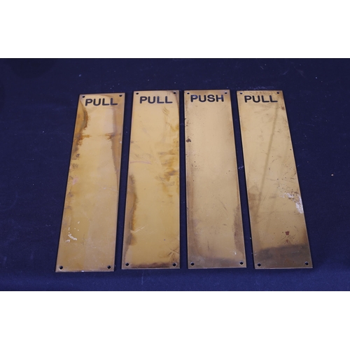 386 - A SET OF FOUR BRASS DOOR FINGER PLATES inscribed 'Push / Pull'