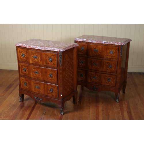 397 - A PAIR OF CONTINENTAL KINGWOOD PARQUETRY AND GILT BRASS MOUNTED CHESTS each of serpentine outline su... 