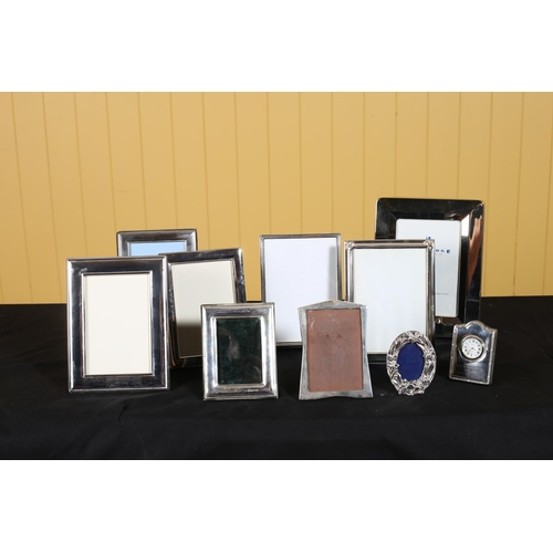 467 - A COLLECTION OF PHOTO FRAMES to include eight silver examples, six plated, a silver cased clock (10)