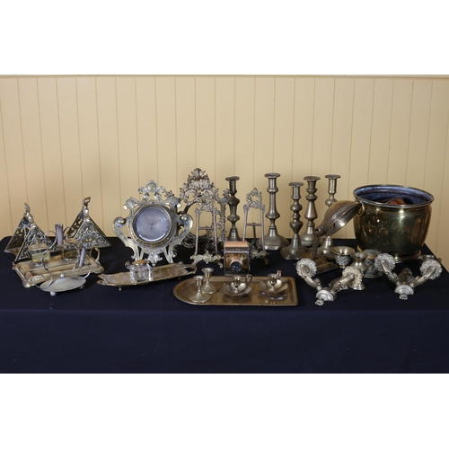 485 - A COLLECTION OF BRASS AND COPPERWARE to include candlesticks, copper jug, desk stand, a pair of bras... 