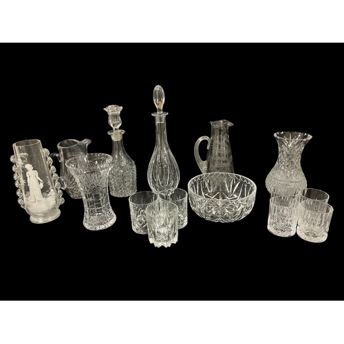 487 - A COLLECTION OF GLASSWARE to include two decanters, a cut glass jug, a set of eight Killarney Crysta... 