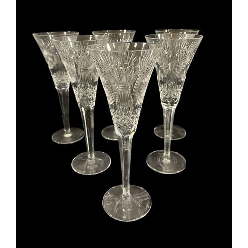 489 - A SET OF SIX WATERFORD CUT GLASS CHAMPAGNE FLUTES