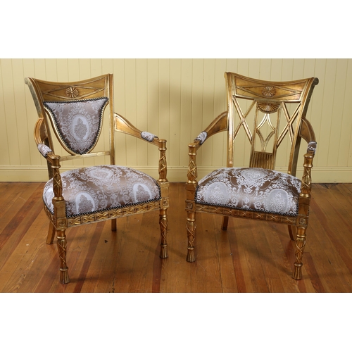 70 - A PAIR OF CONTINENTAL GILTWOOD AND UPHOLSTERED ARMCHAIRS each with a scroll top rail with pierced X-... 