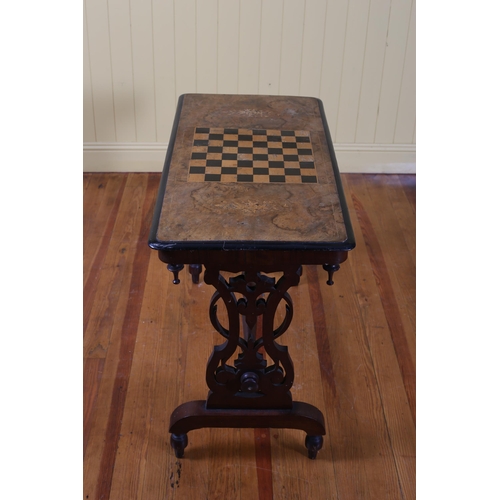 74 - A 19TH CENTURY BURR WALNUT AND MARQUETRY GAMES TABLE of rectangular outline the shaped top centred b... 