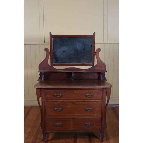 88 - A VINTAGE MAHOGANY DRESSING CHEST the superstructure with bevelled glass mirror above an open shelf ... 