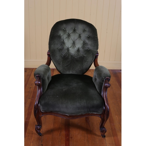 91 - A 19TH CENTURY MAHOGANY AND UPHOLSTERED ARMCHAIR with deep buttoned upholstered back and seat with s... 