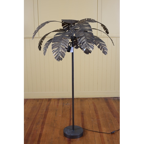 94 - A DESIGNER GILT METAL THREE BRANCH FLOOR STANDARD LAMP in the form of a palm tree the cylindrical co... 