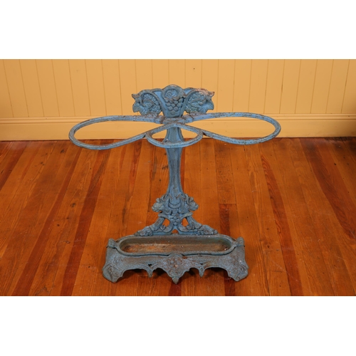 97 - A CAST IRON THREE COMPARTMENT STICK STAND with removable drip tray on a shaped platform base 73cm (h... 