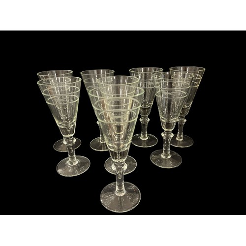 488 - A SET OF EIGHT WINE GLASSES each etched with a fox motif