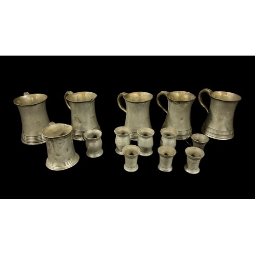 499 - A COLLECTION OF VINTAGE PEWTER comprising five mugs, a collection of spirit measures, A COLLECTION O... 