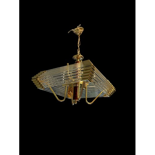 578 - A c.1980s BRASS AND GLASS CHANDELIER the cylindrical simulated tortoiseshell column issuing a four l... 