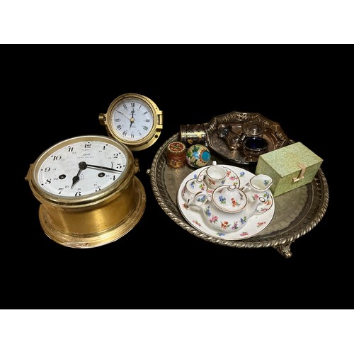 380 - A BRASS WALL MOUNTED SHIP'S CLOCK inscribed 'Schatz Royal Mariner', a seven piece miniature bone Chi... 