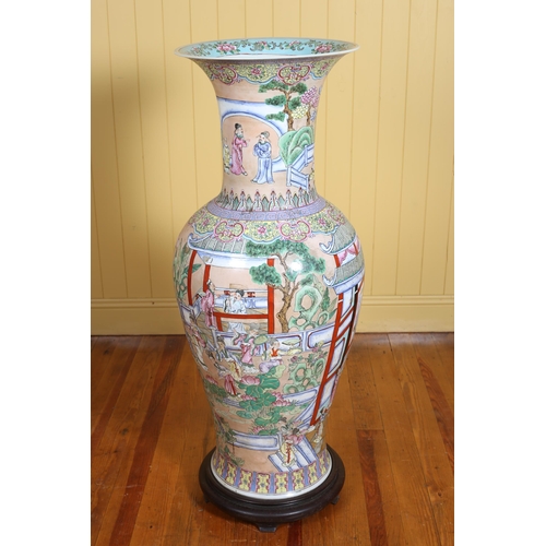 76 - A CHINESE FAMILLE ROSE VASE of baluster form decorated throughout with figures, rustic scenes and st... 