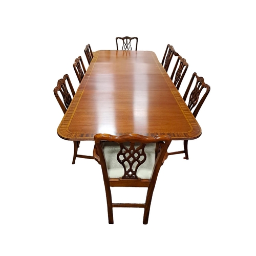 262 - A GEORGIAN STYLE MAHOGANY AND KINGWOOD CROSSBANDED NINE PIECE DINING ROOM SUITE comprising eight cha... 