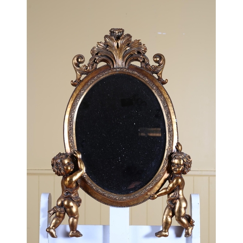 626 - A CONTINENTAL GILT FRAME MIRROR the oval bevelled glass plate within a beadwork and foliate frame ra... 