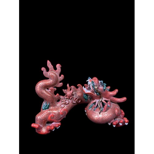 117 - A CHINESE FIGURE china figure modelled as a dragon 
25cm (h) x 36cm (w)