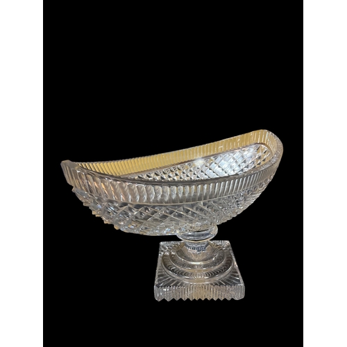 125 - A HOBNAIL CUT BOAT SHAPED CENTRE BOWL raised on a stepped base possibly Waterford 25cm (h) x 42cm (w... 