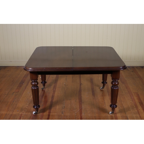 15 - A WILLIAM IV MAHOGANY TELESCOPIC DINING TABLE of rectangular outline with rounded corners and one lo... 