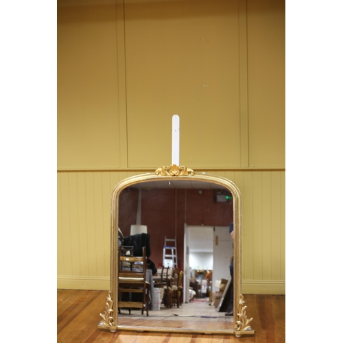 152 - A 19TH CENTURY GILTWOOD OVERMANTEL MIRROR the rectangular arched plate within a moulded frame with s... 