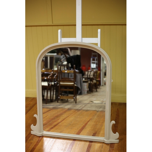 153 - A VICTORIAN STYLE PAINTED OVERMANTEL MIRROR the rectangular plate within a moulded frame with C-scro... 