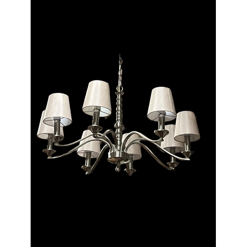 164 - A WHITE BRUSHED METAL EIGHT BRANCH CENTRE LIGHT with scroll arms and shades with link chain suspensi... 