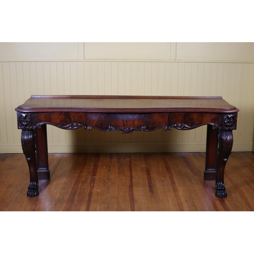 175 - A 19TH CENTURY MAHOGANY CONSOLE TABLE of serpentine outline the shaped top above a carved frieze con... 