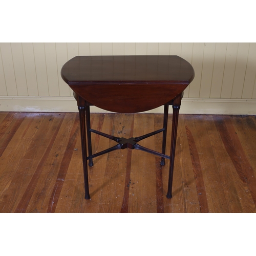 179 - A VINTAGE MAHOGANY OVAL SWIVEL TOP DROP LEAF TABLE the shaped top with frieze drawer on fluted taper... 