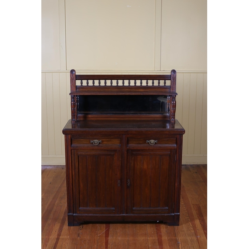 184 - AN EDWARDIAN MAHOGANY SIDE CABINET the superstructure with bevelled glass mirror and moulded shelf a... 