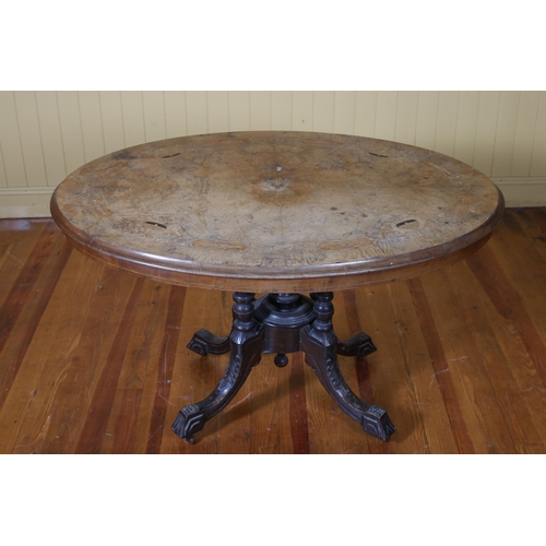 196 - A 19TH CENTURY WALNUT AND MARQUETRY POD TABLE the oval inlaid top raised on quadruped baluster suppo... 