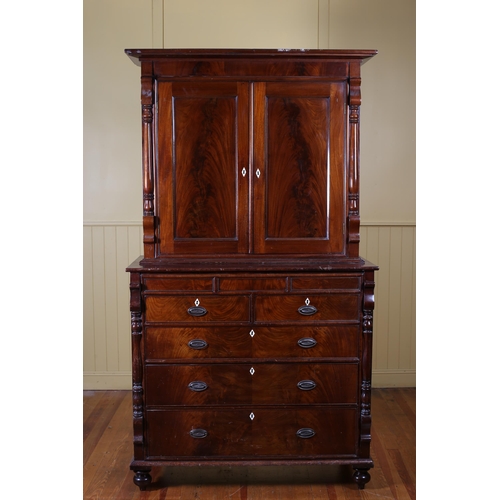 199 - A 19TH CENTURY MAHOGANY CUPBOARD ON CHEST the moulded cornice above a pair of panel doors between ba... 