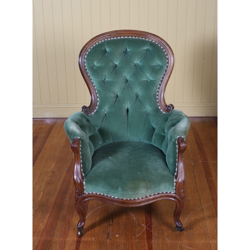 208 - A 19TH CENTURY ROSEWOOD ARMCHAIR the shaped top rail above a buttoned upholstered back and seat with... 