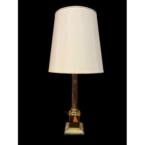 226 - A BRASS CORINTHIAN COLUMN TABLE LAMP the reeded column raised on a square column with embossed brass... 