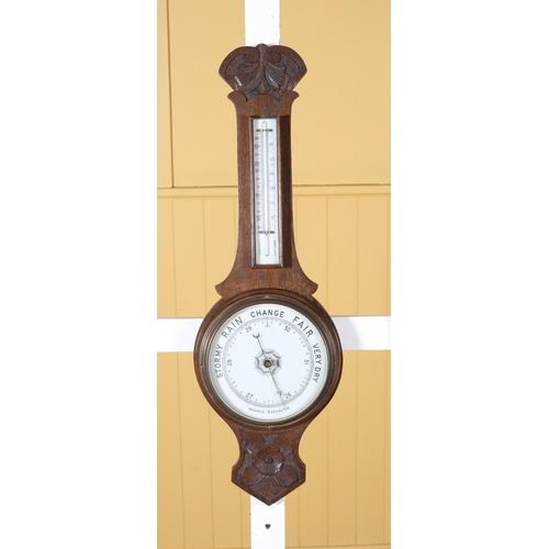 231 - AN EDWARDIAN CARVED OAK BANJO BAROMETER 80cm (h) x 29cm (w), A VINTAGE OAK DROP DIAL CASE WALL CLOCK... 