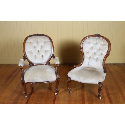 29 - A PAIR OF VICTORIAN MAHOGANY AND UPHOLSTERED LADY'S AND GENTLEMAN'S DRAWING ROOM CHAIRS each with a ... 