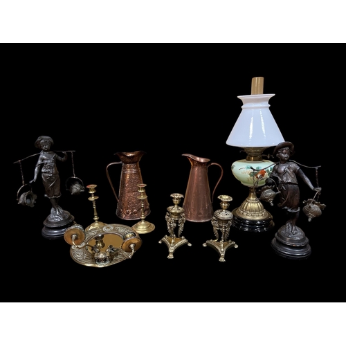 301 - A MISCELLANEOUS COLLECTION to include two pairs of brass candlesticks, a brass mirror with candle sc... 